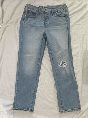 Universal Thread Mid Rise 80’s Slim light blue jeans. Women’s size 12.